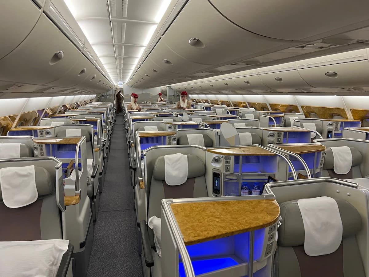 The A380 upper deck remains Emirates' signature experience — quieter, more private, genuinely spacious