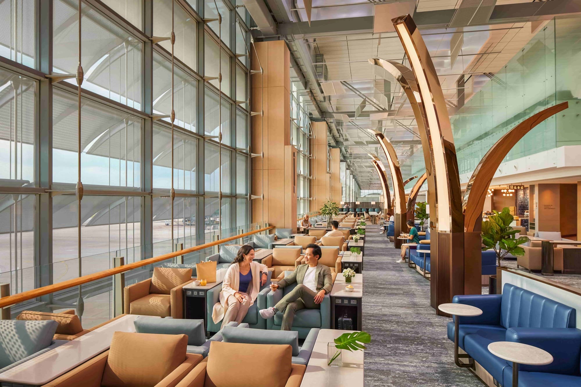 Singapore Airlines KrisFlyer Gold Lounge at Changi Airport, spacious and bright with high ceilings and extensive seating. Photo by Singapore Airlines.