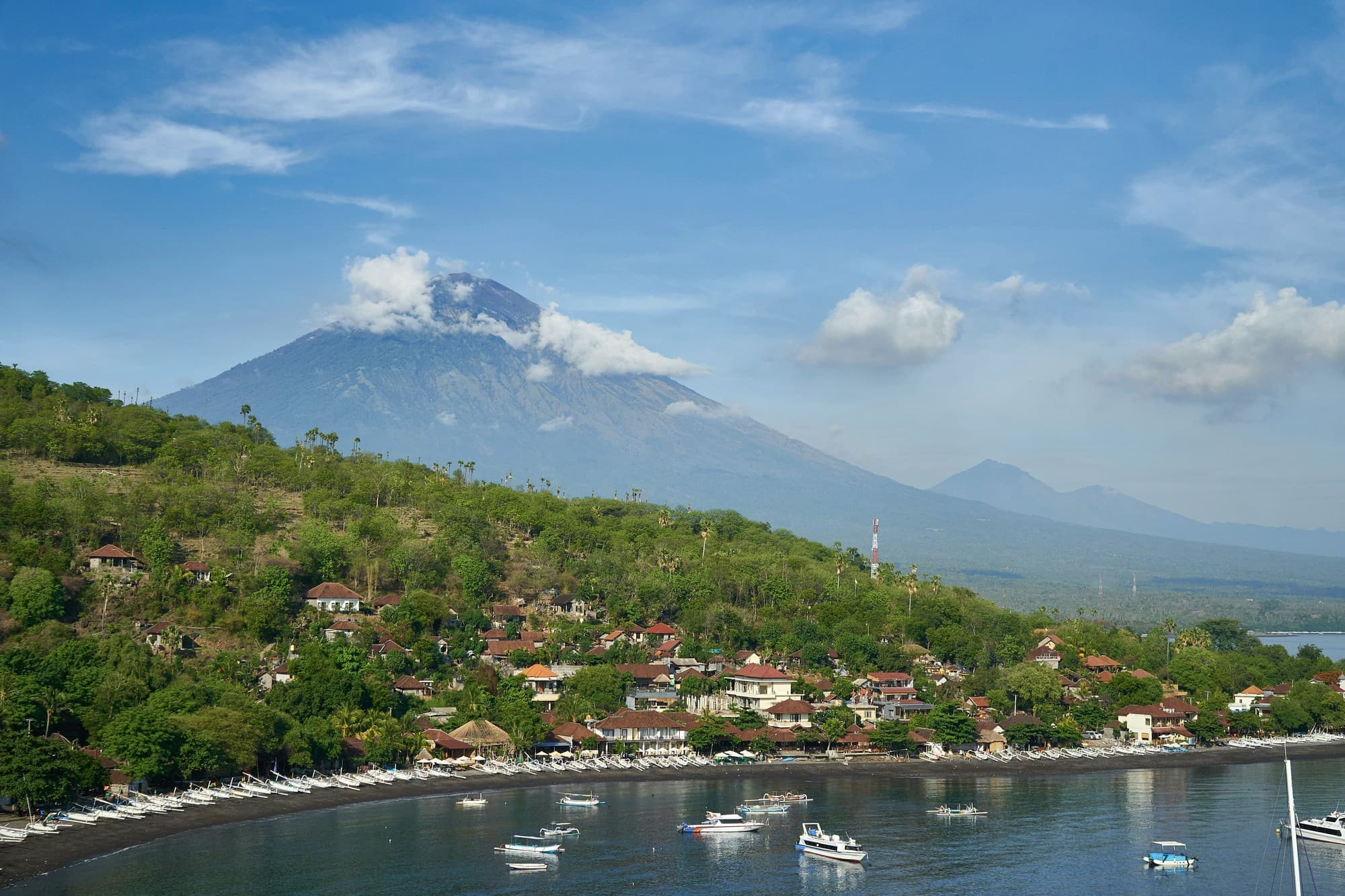 Volcanic sand beach at Amed with Mount Agung in the background. Photo by Pitua Sutanto.