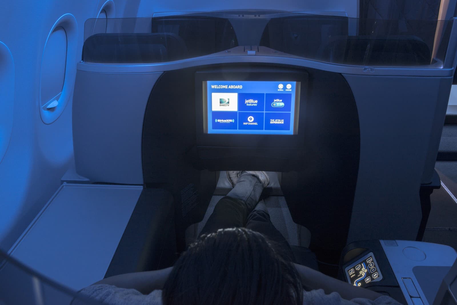 JetBlue Mint Classic business class seat with ample legroom, and a large entertainment screen. Photo by JetBlue.