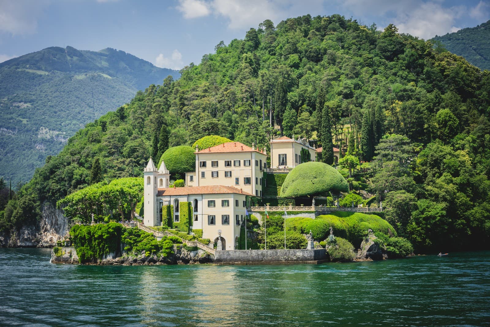 The elegant Villa del Balbianello graces the lush, forested peninsula of Lake Como, its gardens and historic charm making it one of Italy’s most iconic and cinematic lakeside landmarks.