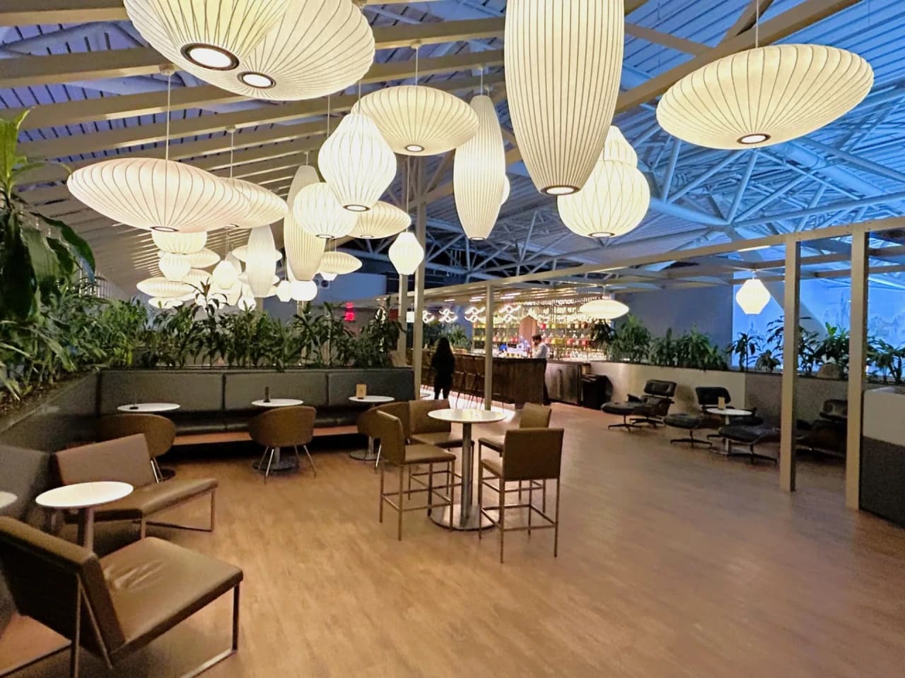 Greenwich Lounge at JFK Terminal 8 — Qatar Airways business class passengers enjoy lounge access before QSuite flights to Doha