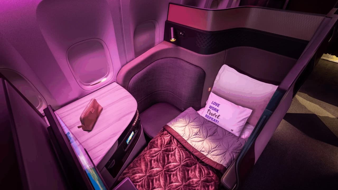 The difference between a red-eye you dread and one you look forward to — a lie-flat bed changes everything