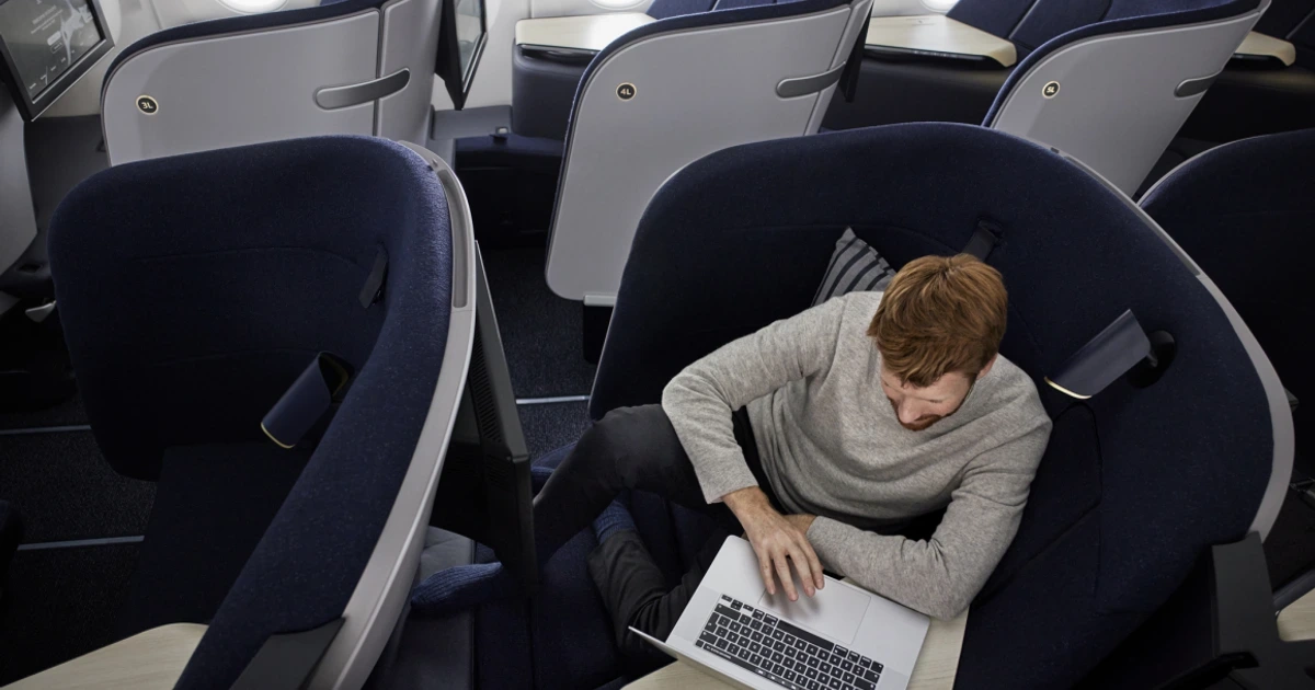 Finnair's business class seat offers a stable workspace and natural cabin lighting for productive long-haul flights.