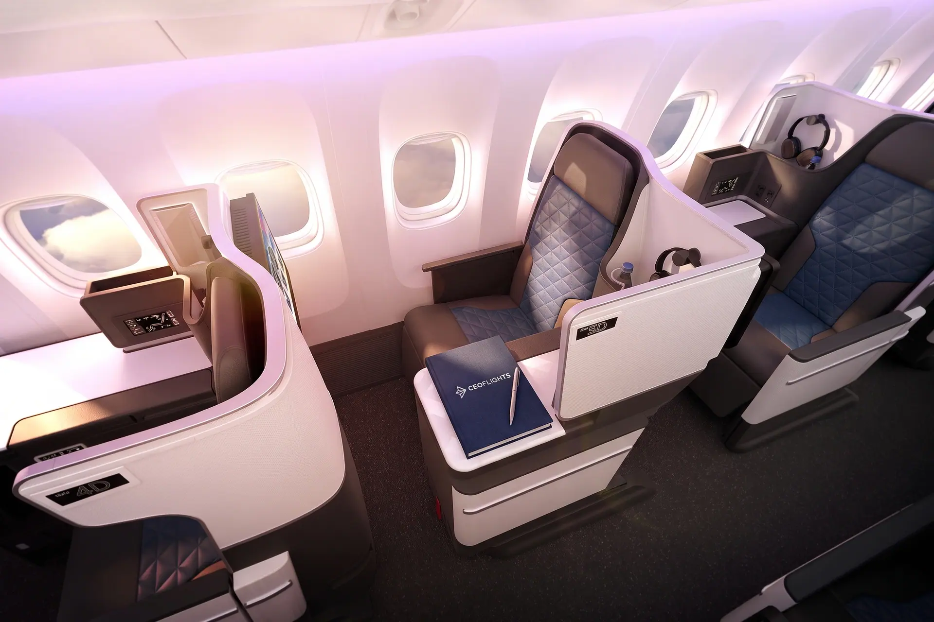A private Business Class suite with a lie-flat seat, a navy CEOFLIGHTS notebook and pen on the side table